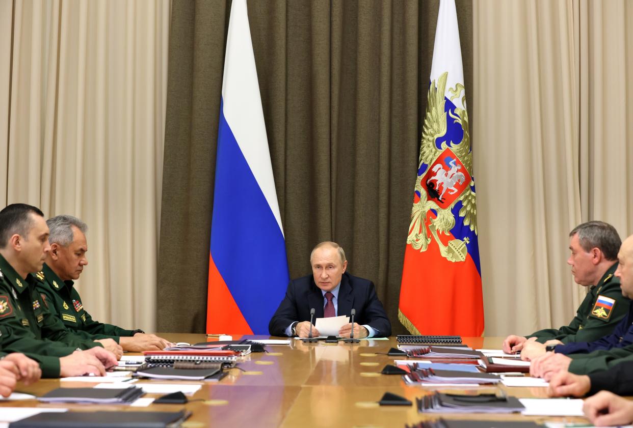 Russian President Vladimir Putin, center, speaks during a meeting with Defense Ministry hight level officials and heads of defense industry at the Bocharov Ruchei residence in the Black Sea resort of Sochi, Russia, Wednesday, Nov. 3, 2021. (Mikhail Metzel, Sputnik, Kremlin Pool Photo via AP)