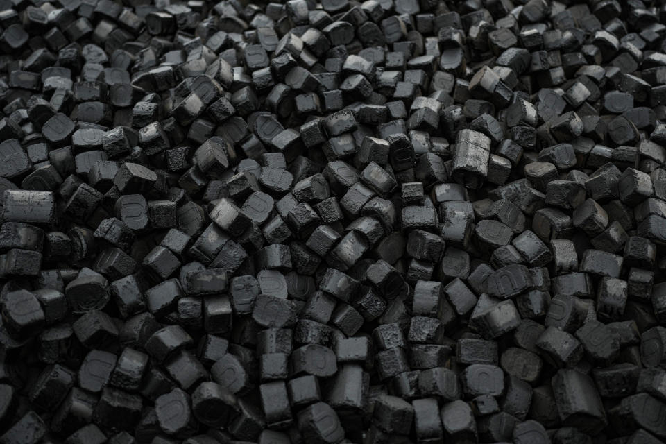 Coal briquettes are piled up at a selling point in Ostrava, Czech Republic, Friday, Nov. 11, 2022. High energy prices linked to Russia's war in Ukraine have paved the way for coal’s comeback, endangering climate goals and threatening health from increased pollution. (AP Photo/Petr David Josek)