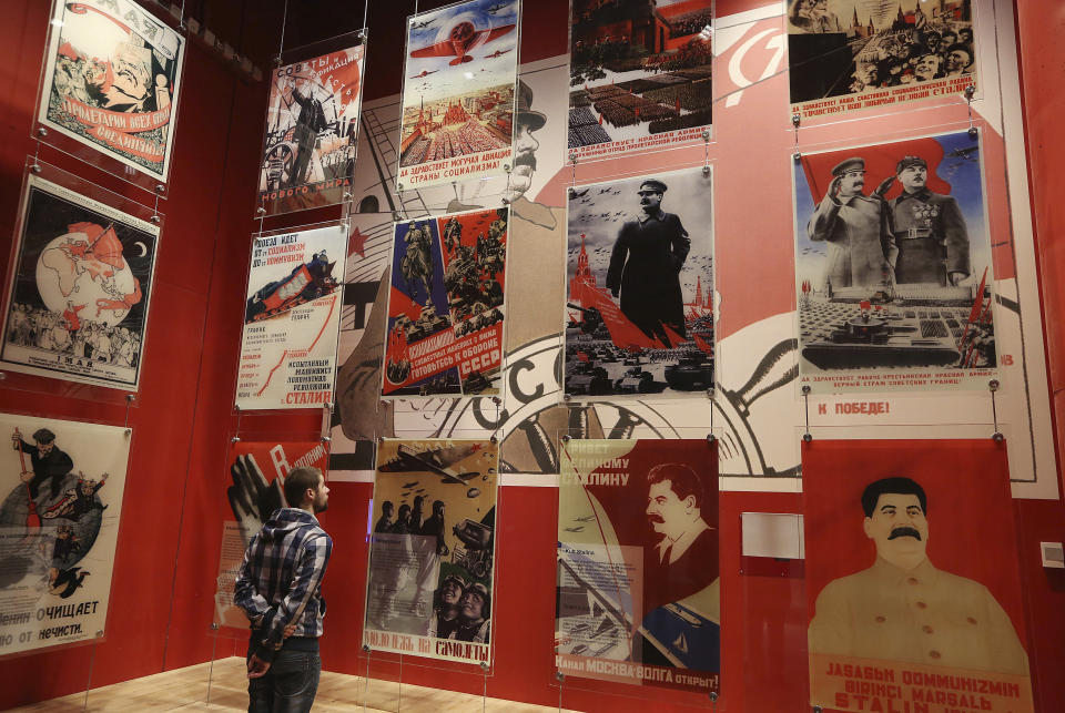 A man looks at an exhibit in the Museum of the Second World War, an ambitious new museum under creation for nine years has opened its doors for a day to historians, museums and reporters in Gdansk, Poland, on Monday, Jan. 23, 2017. (AP Photo/Czarek Sokolowski)