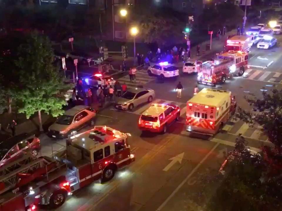 Rescue vehicles are seen following a shooting in Washington DC on 19 September: CHRIS G COLLISON via REUTERS