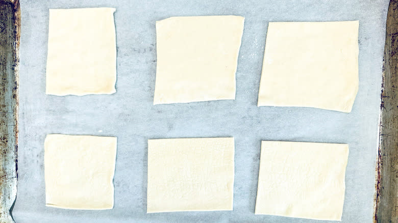 pastry squares on baking sheet