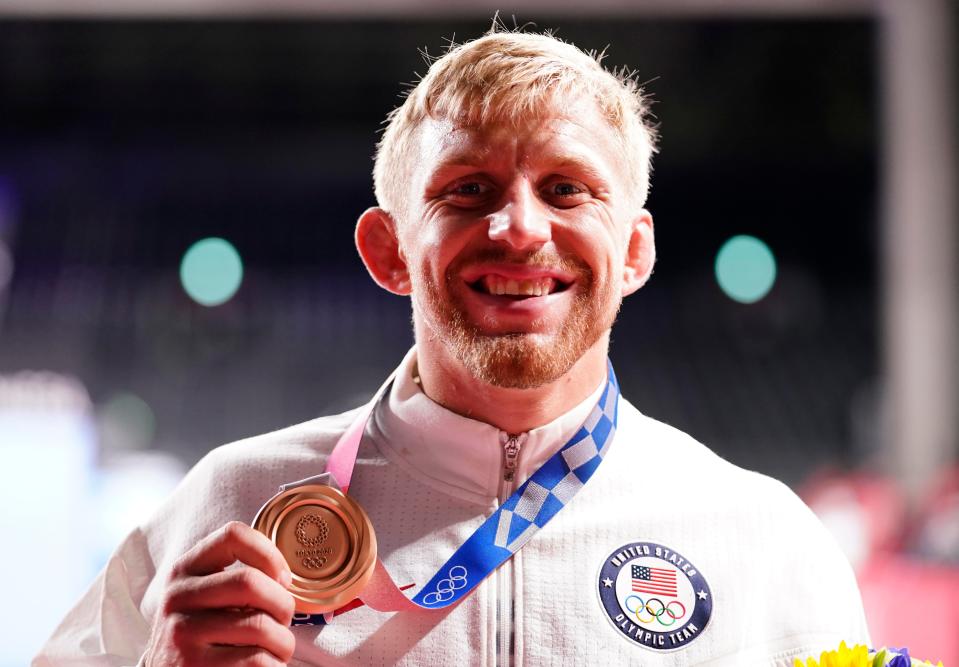 Aug 6, 2021; Chiba, Japan;  Kyle Dake (USA) with his bronze medal during the medal ceremony for the men's freestyle 74kg wrestling competition bronze medal match during the Tokyo 2020 Olympic Summer Games at Makuhari Messe Hall A.