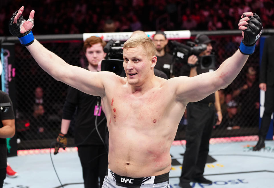 ORLANDO, FLORIDA - DECEMBER 03: Sergei Pavlovich of Russia reacts after his TKO victory over Tai Tuivasa of Australia in a heavyweight fight during the UFC Fight Night event at Amway Center on December 03, 2022 in Orlando, Florida. (Photo by Jeff Bottari/Zuffa LLC)