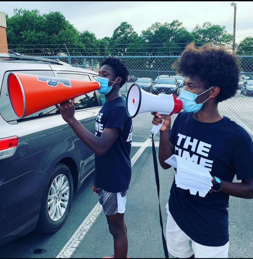 Tyler, Texas students Nick Knight and Felix Lamb protest a recent school board meeting and demanding the name of their high school, named after Confederate leader Robert E. Lee, be changed. (Photo courtesy of Nick Knight.)