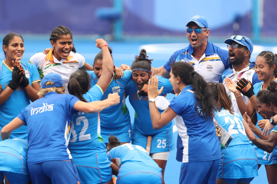 TOKYO, JAPAN - AUGUST 02: Navneet Kaur and Navjot Kaur (C) of Team India celebrate their 1-0 win with teammates after the Women's Quarterfinal match between Australia and India on day ten of the Tokyo 2020 Olympic Games at Oi Hockey Stadium on August 02, 2021 in Tokyo, Japan. (Photo by Alexander Hassenstein/Getty Images)