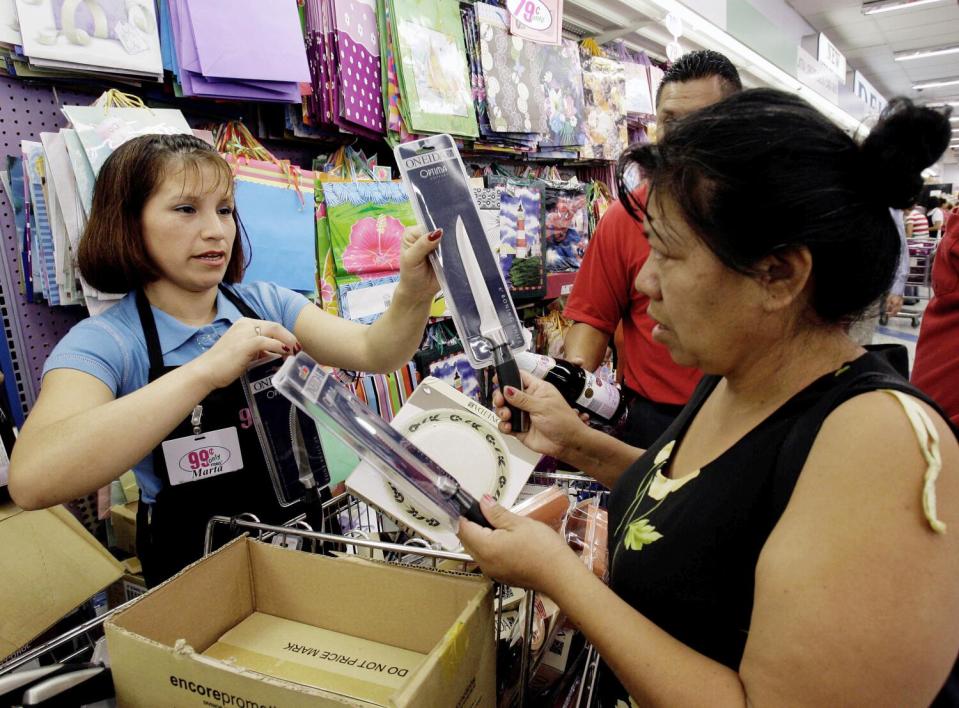 A 99 Cents Only store worker helping a customer in 2008