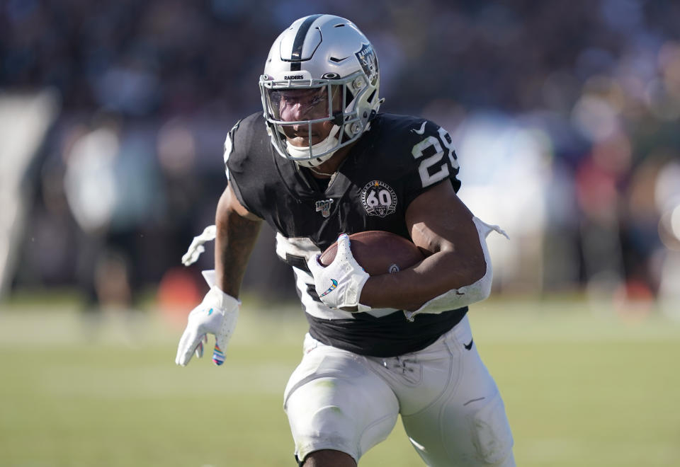 Josh Jacobs #28 of the Oakland Raiders scores 