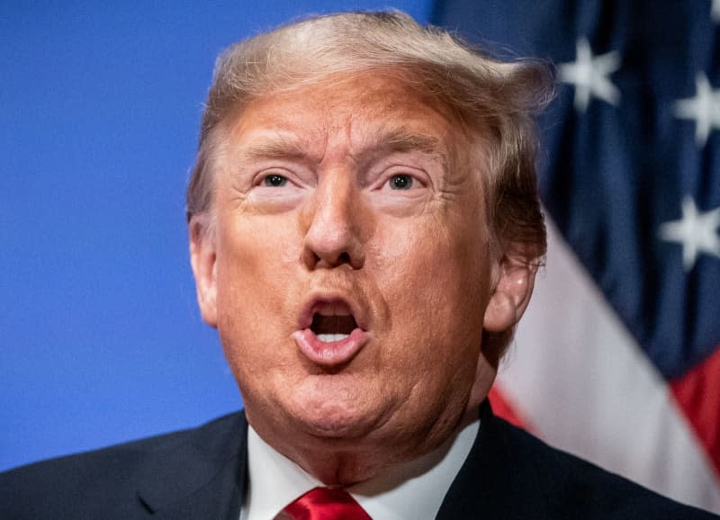 Donald Trump, then US President, speaks at the start of a bilateral conversation with Chancellor Merkel after the working session of the NATO summit. Michael Kappeler/dpa