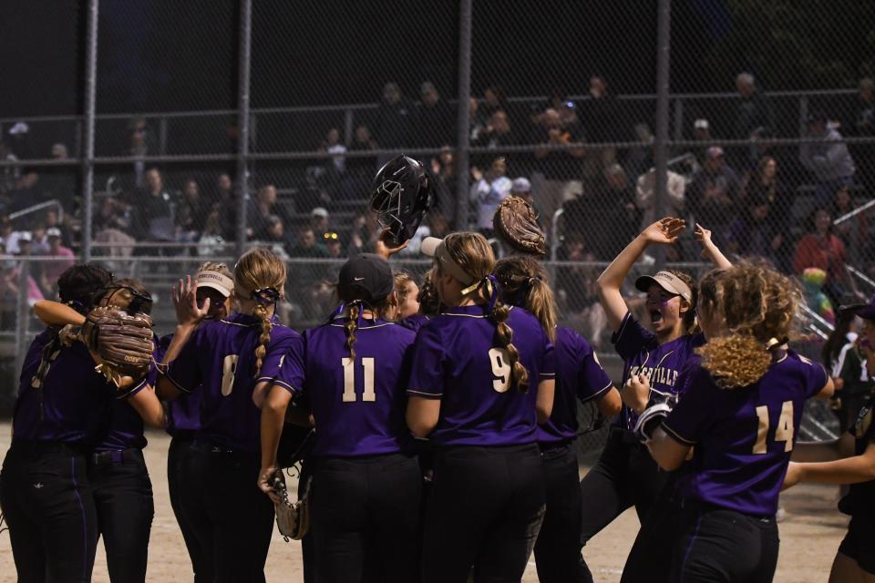 Members of the Fowlerville softball team celebrate after beating Portland St. Patrick 5-4 Thursday, June 2, 2022, in a Softball Classic semifinal at Ranney Park in Lansing.