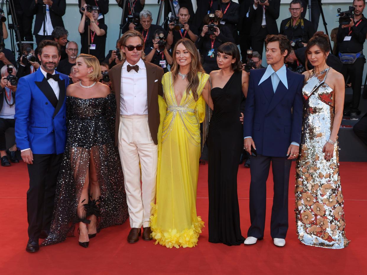 Nick Kroll, Florence Pugh, Chris Pine, Olivia Wilde, Sydney Chandler, Harry Styles, and Gemma Chan pose for photographers upon arrival at the premiere of the film 'Don't Worry Darling' during the 79th edition of the Venice Film Festival in Venice, Italy, Monday, Sept. 5, 2022.