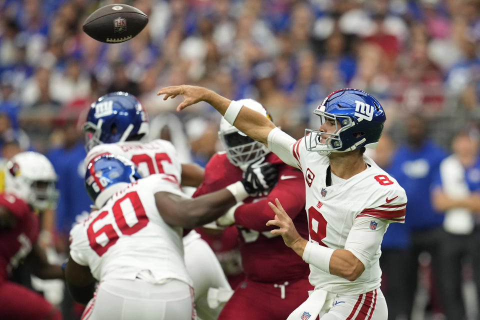 New York Giants quarterback Daniel Jones (8) throws against the Arizona Cardinals during the first half of an NFL football game, Sunday, Sept. 17, 2023, in Glendale, Ariz. (AP Photo/Ross D. Franklin)