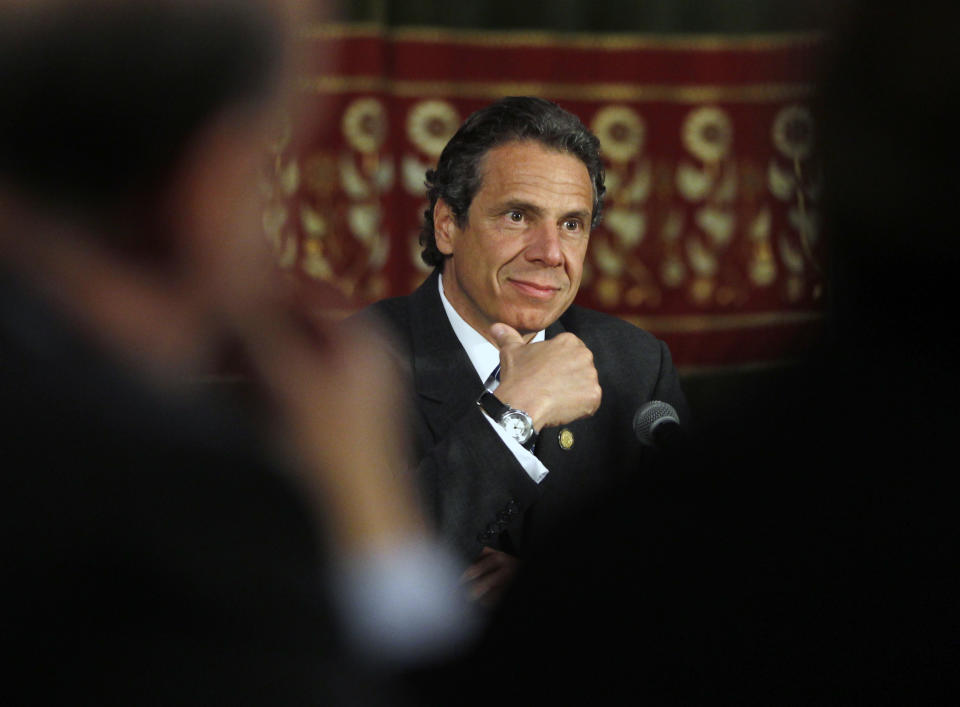 New York Gov. Andrew Cuomo listens to a speaker during a NY Works news conference in the Red Room at the Capitol in Albany, N.Y., on Thursday, May 3, 2012. Cuomo says he’s considering new ideas to pay for replacing the Tappan Zee Bridge after the federal government rejected a $2 billion loan application. The proposed $5.2 billion Tappan Zee is a high priority for Cuomo. It would build two spans to replace an aging, overcrowded bridge across the Hudson in New York City's suburbs. (AP Photo/Mike Groll)