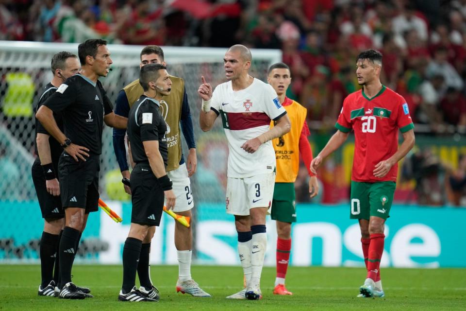 Portugal's Pepe talks to referee Facundo Tello from Argentina (AP)