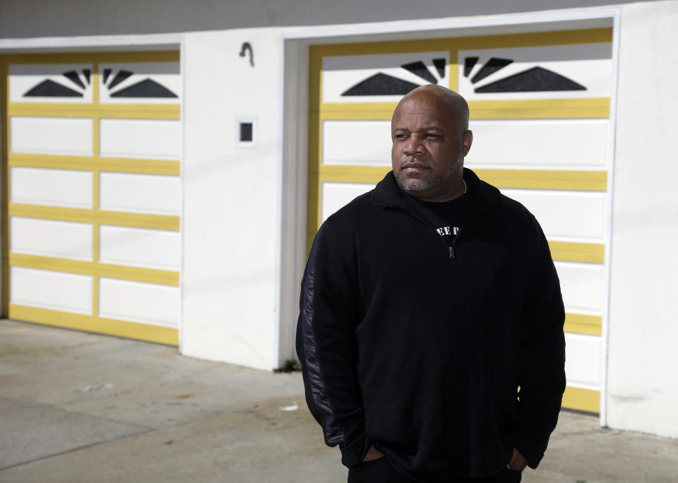 In this Thursday, Feb. 13, 2014 photo, Ernest Morgan poses for a portrait, in San Francisco. Morgan was released from San Quentin State Prison in 2011 after serving 24 years for the shotgun slaying of his stepsister as he burglarized his parents' home. Record numbers of murderers and other convicts serving life sentences with the possibility of parole are being freed from California’s prisons as a result of key court rulings, new laws and efforts by officials to ease severe overcrowding at the state’s correctional facilities. (AP Photo/Marcio Jose Sanchez)