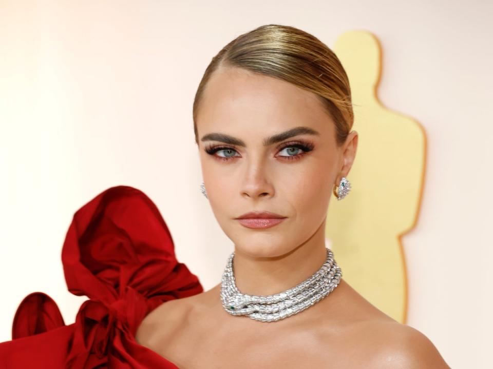 Cara Delevingne claimed 33rd place on the under-35s rich list (Getty Images)