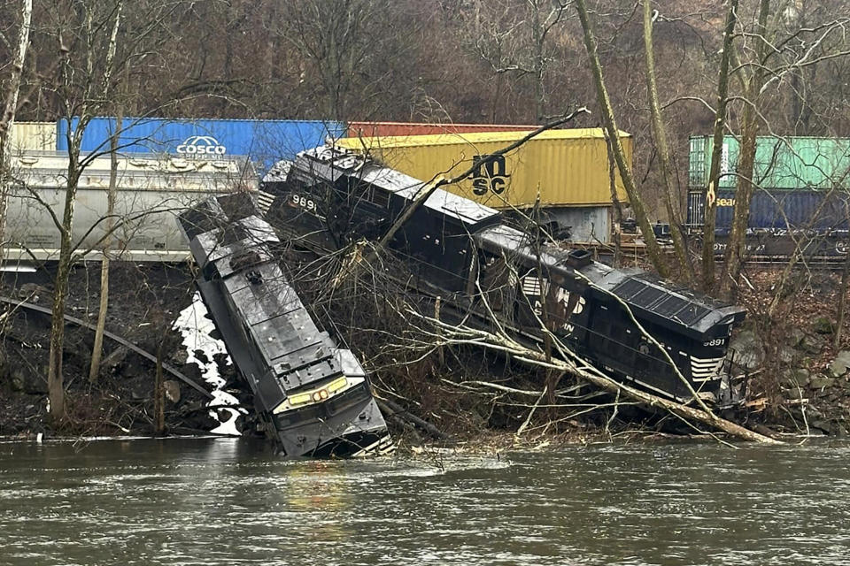 FILE - This photo provided by Nancy Run Fire Company shows a train derailment along a riverbank in Saucon Township, Pa., March 2, 2024. The collision highlights the shortcomings of the automated braking system that was created to prevent such crashes. None of the circumstances the National Transportation Safety Board described Tuesday, March 26, in its preliminary report on the derailment would have triggered the automated positive train control system to stop the trains. (Nancy Run Fire Company via AP, File)