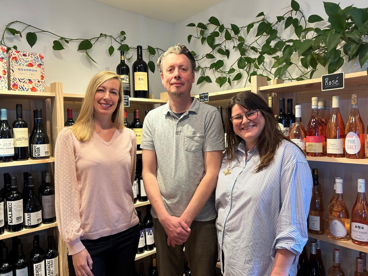 From left, Amy Ashcraft, Adam Fleischer and Sam Smith are owners for Village Wine Company, located at 126 S. Main St. in Granville.