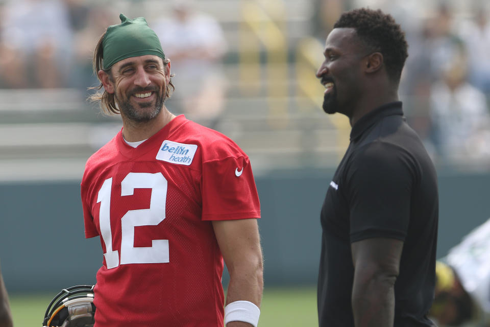 Green Bay Packers quarterback Aaron Rodgers (12) talks with NFL Network host and former Packers teammate James Jones during a training camp practice. (Photo by Larry Radloff/Icon Sportswire via Getty Images)