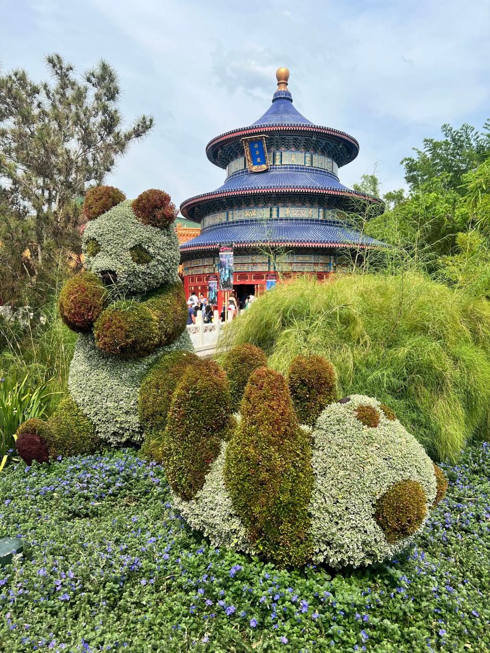 Topiaries of giant pandas are seen near the China pavilion during EPCOT International Flower & Garden Festival.