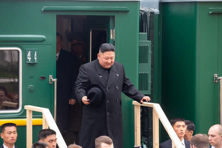 North Korean leader Kim Jong Un disembarks from a train during a welcoming ceremony at a railway station in the far eastern settlement of Khasan, Russia April 24, 2019. Press Service of Administration of Primorsky Krai/Alexander Safronov/Handout via REUTERS