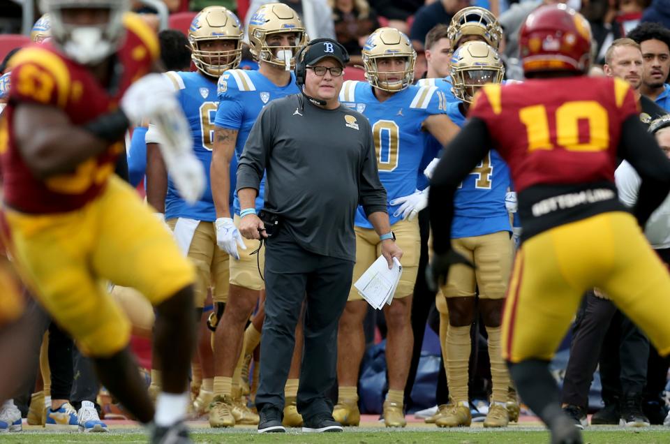 UCLA coach Chip Kelly watches his team during the first quarter against Southern California at United Airlines Field at Los Angeles Memorial Coliseum.