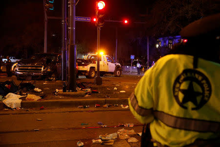 A vehicle is seen crashed along the Endymion parade route at Orleans and Carollton during Mardi Gras in New Orleans, Louisiana U.S., February 25, 2017. REUTERS/Shannon Stapleton