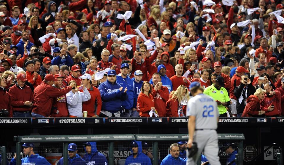 Dodgers pitcher Clayton Kershaw comes out of the game against the Cardinals in game 6 of the NLCS