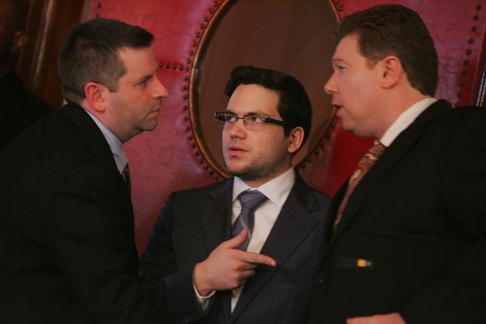 Alahverdian, center, speaks with state Rep. Scott Slater, left, and Boston lawyer Jonathan Messinger in the Rhode Island State House in 2012.