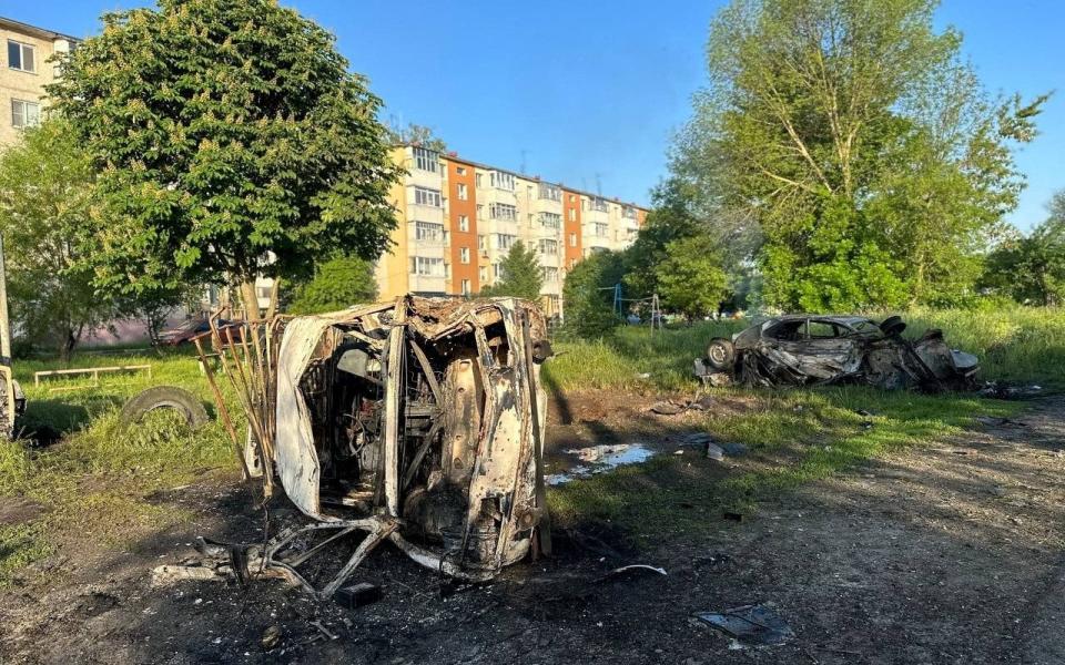 A view shows destroyed vehicles following what was said to be Ukrainian forces' shelling in Belgorod - GOVERNOR OF BELGOROD REGION/via REUTERS