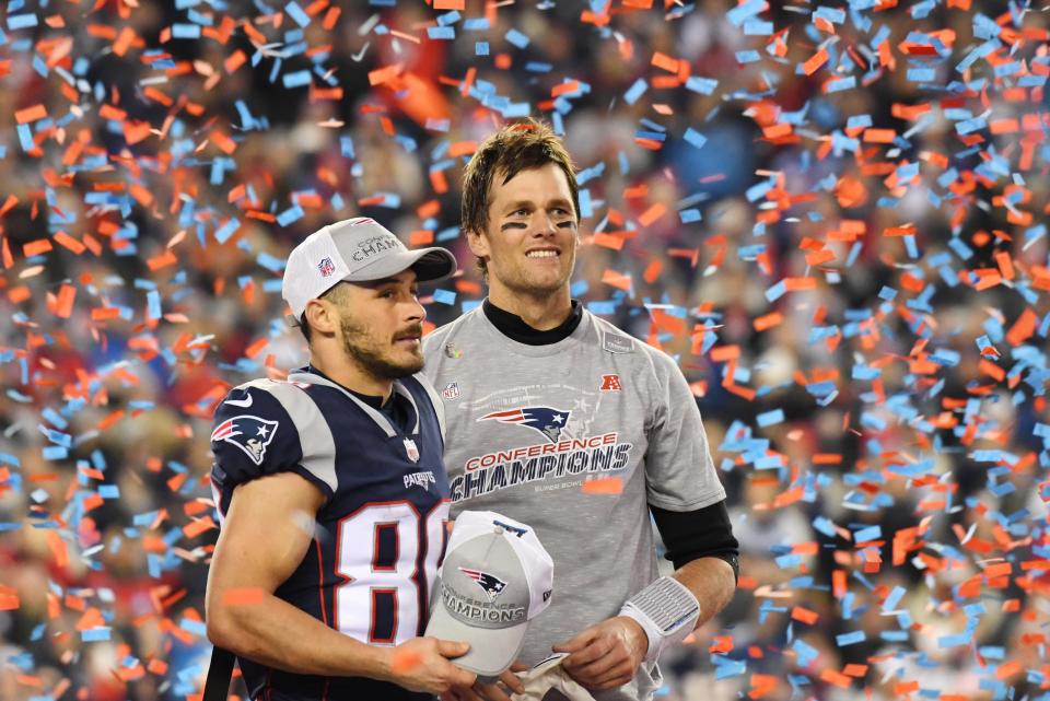 Jan 21, 2018; Foxborough, MA, USA; New England Patriots quarterback Tom Brady (right) and wide receiver Danny Amendola (80) celebrate as confetti flies after the AFC Championship Game against the Jacksonville Jaguars at Gillette Stadium. Mandatory Credit: Robert Deutsch-USA TODAY Sports - 10557977