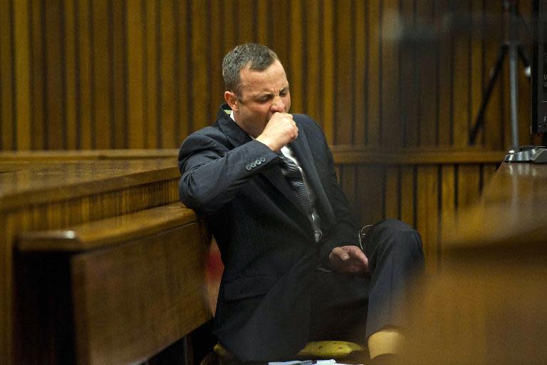 South African paralympian Oscar Pistorius yawns during his trial on April 17, 2014 at the North Gauteng High Court in Pretoria