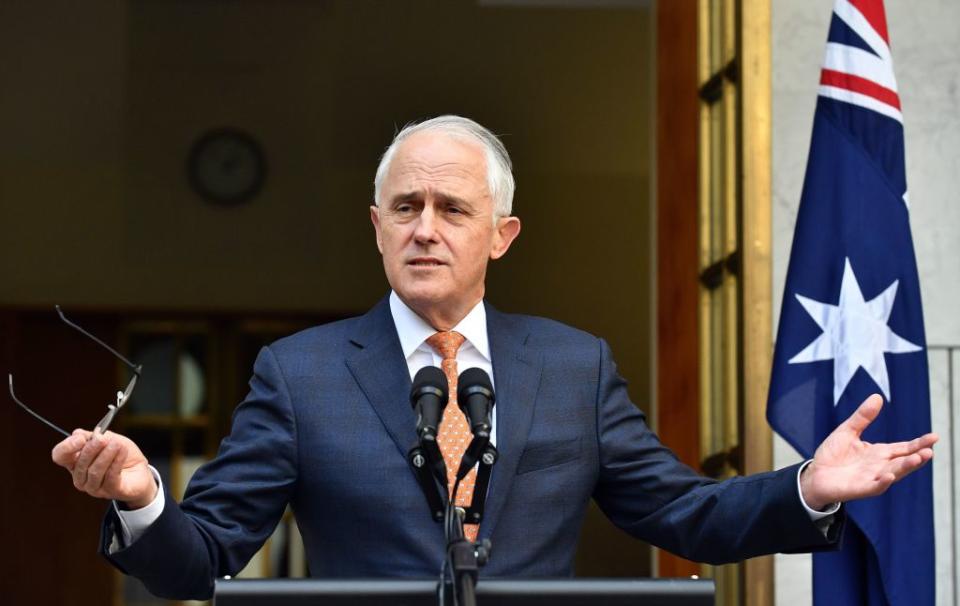 Australia's outgoing Prime Minister Malcolm Turnbull gestures at a press conference after a party meeting in Canberra on August 24, 2018. (SAEED KHAN/AFP via Getty Images)