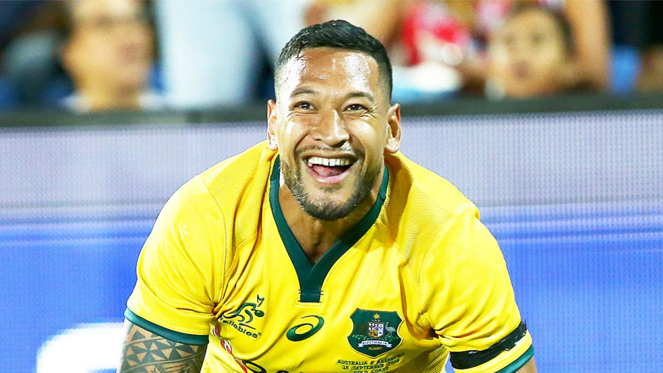 Israel Folau (pictured) after scoring a try.