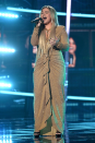 <p>Kelly Clarkson proceeded to make some more amazing outfit changes, including this ruched number.</p>