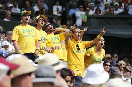 Australian fans cheer on Bernard Tomic of Australia during his match against Novak Djokovic of Serbia at the Wimbledon Tennis Championships in London, July 3, 2015. REUTERS/Suzanne Plunkett