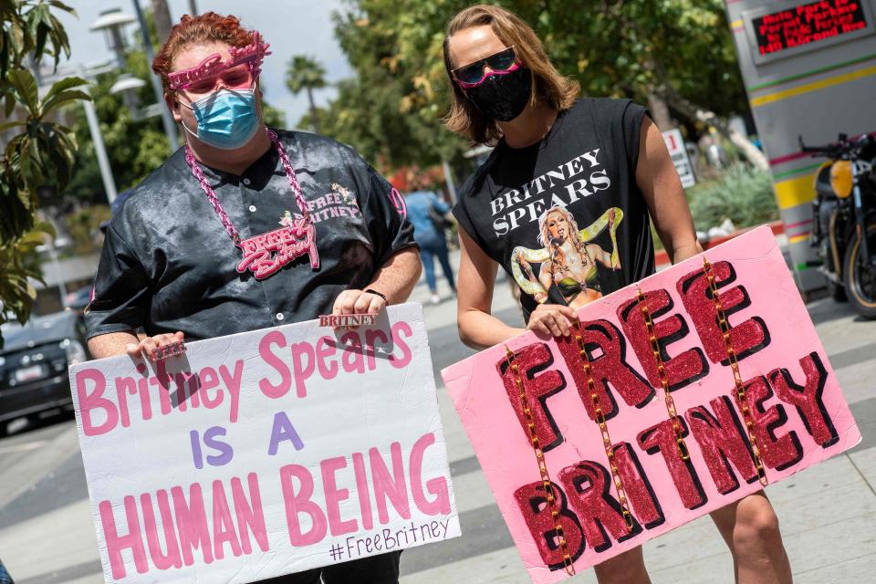 Supporters of the "Free Britney" movement gather outside a conservatorship court hearing in Los Angeles in 2021.