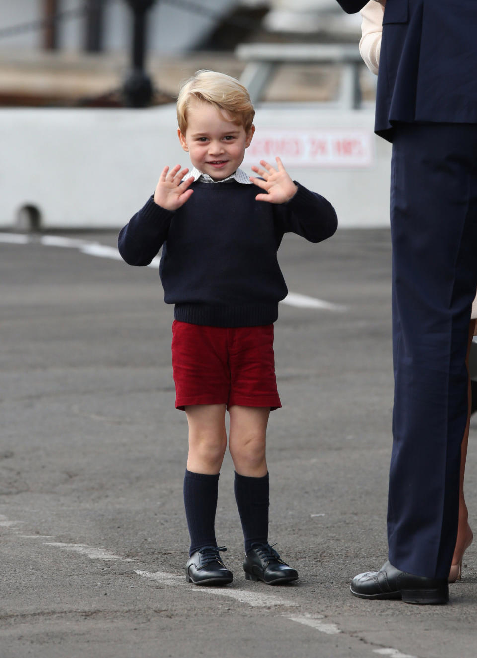 Dressed to impress for his last day in Canada, the little Prince waved enthusiastically to the crowd. 