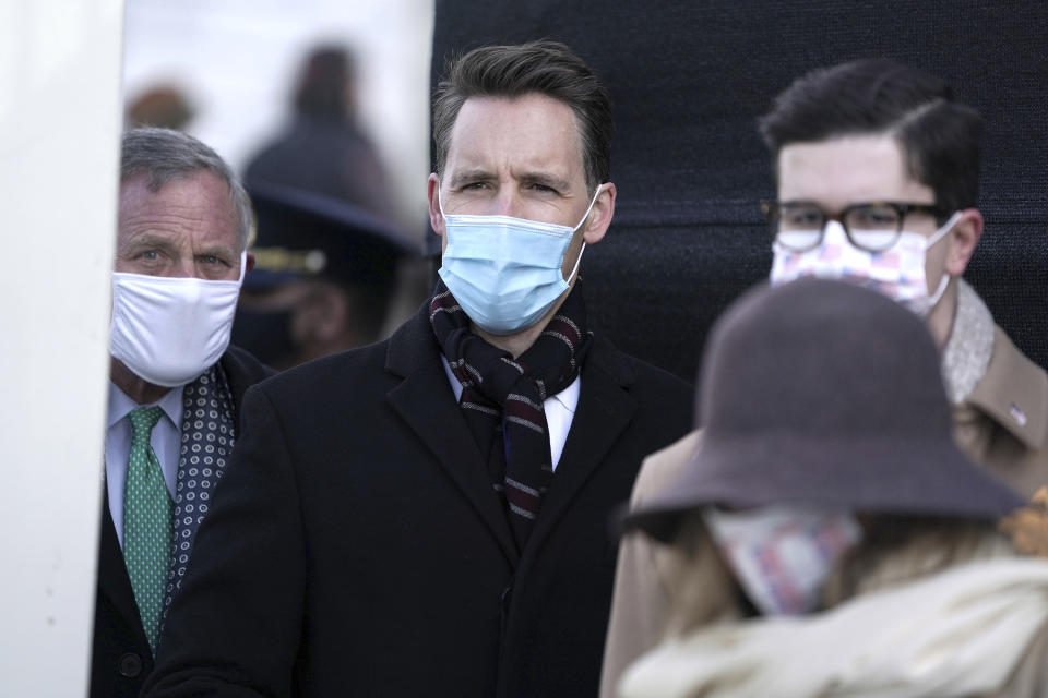 Sen. Josh Hawley, R-Mo., center, watches before President-elect Joe Biden’s inauguration, Wednesday, Jan. 20, 2021, at the U.S. Capitol in Washington.(Greg Nash/Pool Photo via AP)