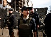 FILE PHOTO: Ukraine's Prosecutor General Iryna Venediktova talks to journalists beside buildings that were destroyed by Russian shelling, amid Russia's Invasion of Ukraine, during her visit in Borodyanka