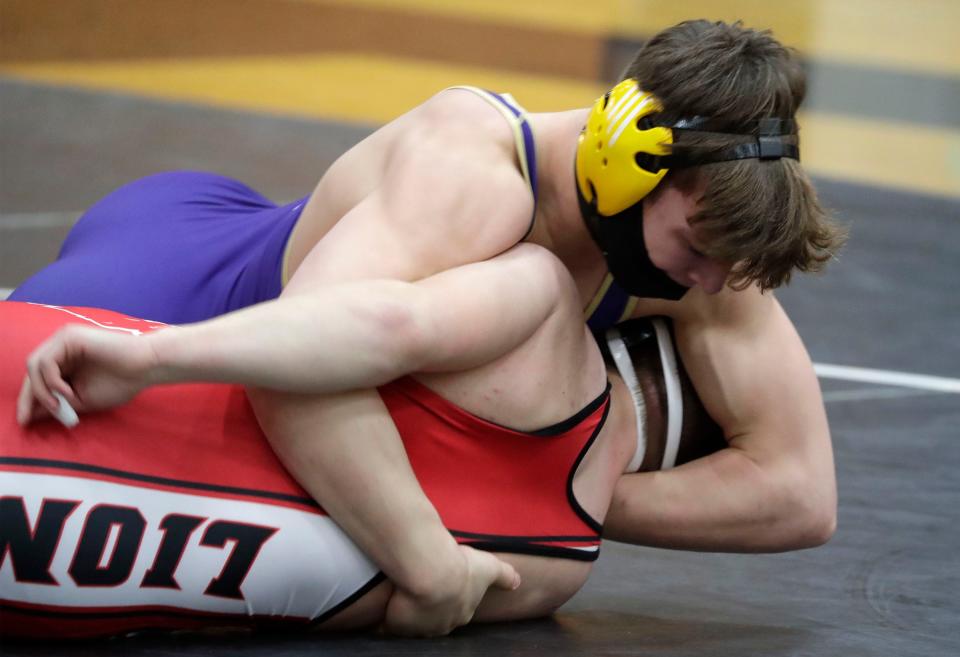 Two Rivers' Chase Matthias wrestles Brillion's Jaden Bastian in a 170-pound match at the WIAA Div. 2 wrestling regional, Saturday, January 30, 2021, in Two Rivers, Wis.