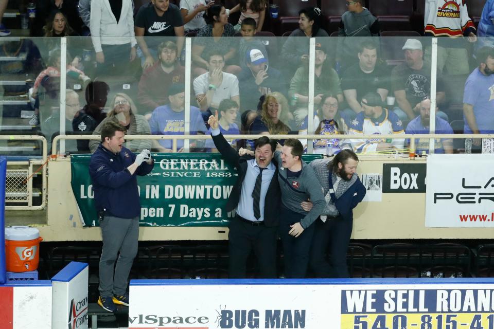 Peoria Rivermen head coach Jean-Guy Trudel celebrates on the bench as his team clinches the 2022 SPHL President's Cup in a Game 4 win over Roanoke at Berglund Center on May 3, 2022.