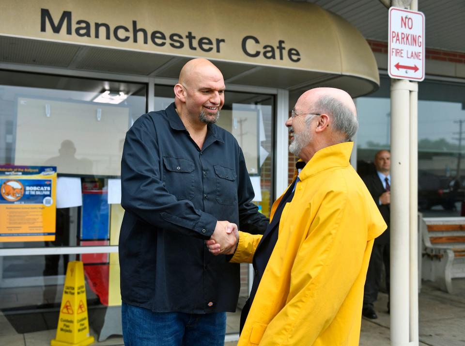 Tom Wolf, right, meets with John Fetterman outside a restaurant in Manchester. Wolf had gained his second term as governor in 2018, and he was joined by Fetterman as lieutenant governor. Wolf had won the governorship over fellow York County resident Scott Wagner in that election, a confluence of county residents vying for top state positions.