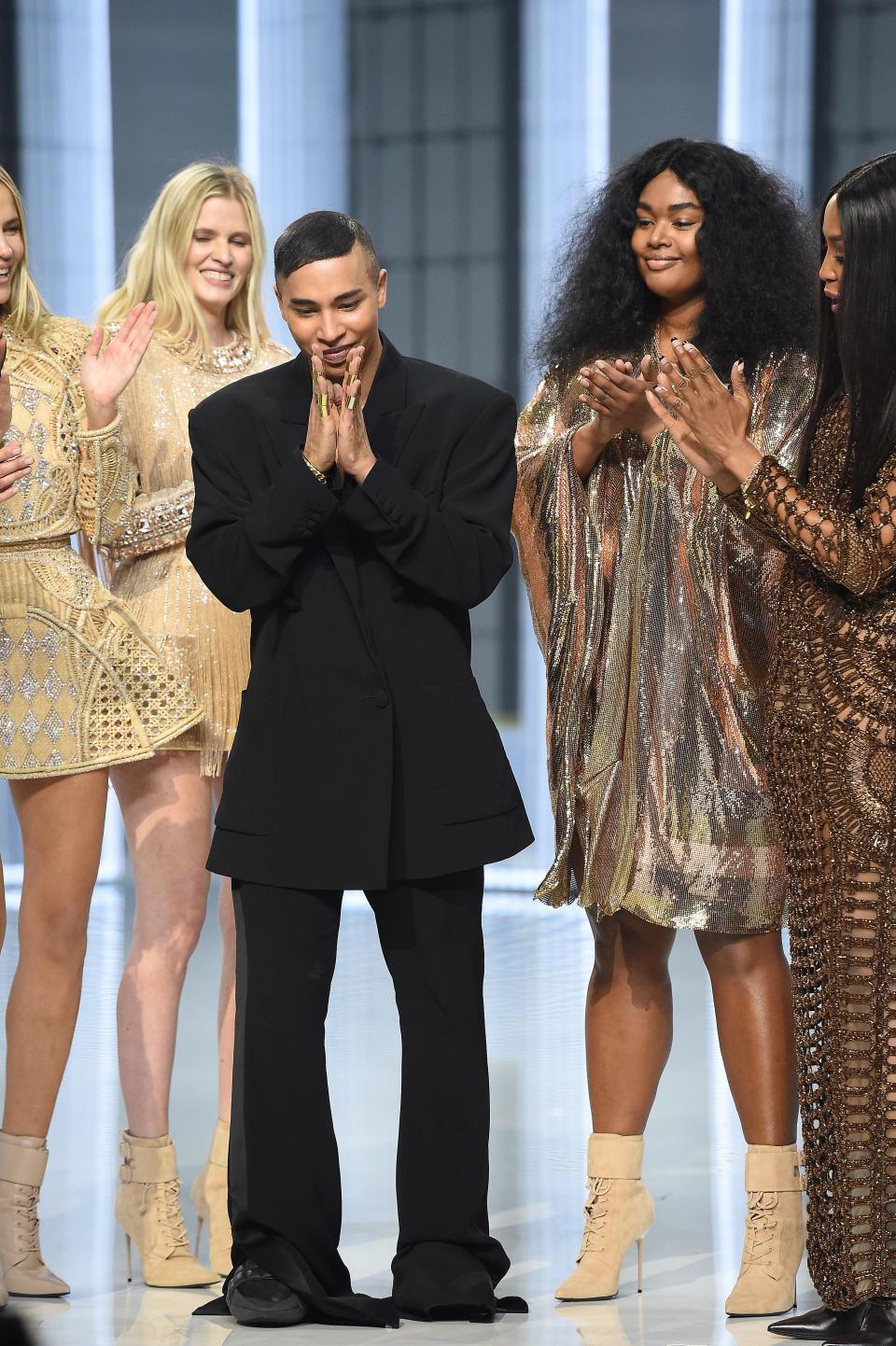 Designer Olivier Rousteing and models walk the runway during the Balmain Festival V02 Womenswear Spring/Summer 2022 show as part of Paris Fashion Week on September 29, 2021.