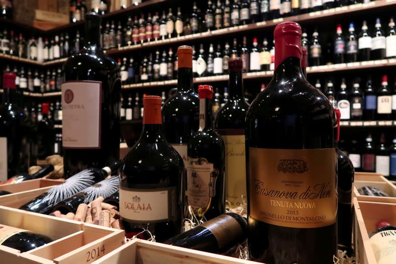 FILE PHOTO: Brunello di Montalcino's red wine bottles are displayed in a wine shop of Tuscan town of Montalcino