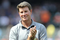 FILE - This photo taken June 30, 2012 shows former Baltimore Orioles Hall of Fame pitcher Jim Palmer applauds during a ceremony honoring former manager Earl Weaver in Baltimore, June 30, 2012. Jim Palmer pitched 25 complete games in 1975. The entire major leagues have combined for 35 this year, down from 50 last season and 622 in 1988. (AP Photo/Gail Burton, File)