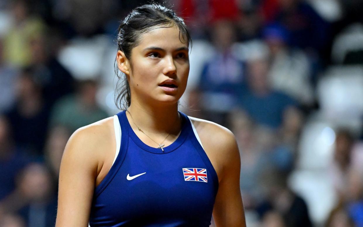 Emma Raducanu of Great Britain looks on her match against Caroline Garcia of France during the Billie Jean King Cup Qualifier match between France and Great Britain