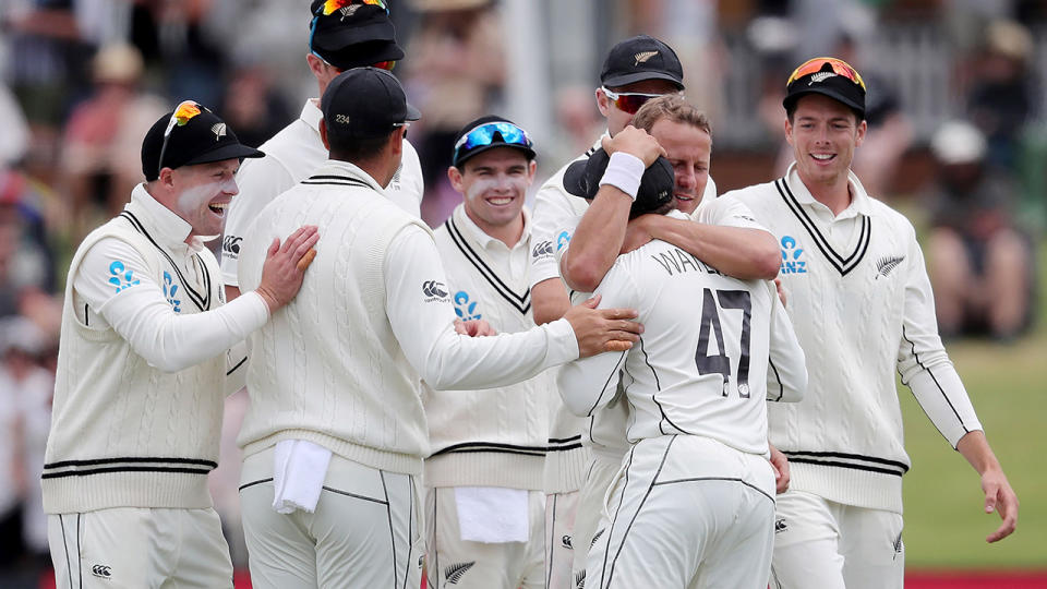 New Zealand celebrate after defeating Pakistan in the second Test of their four-match series. (Photo by MICHAEL BRADLEY / AFP) (Photo by MICHAEL BRADLEY/AFP via Getty Images)