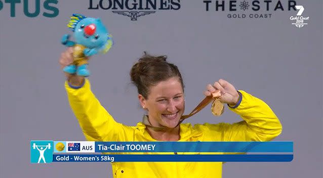 Gladstone woman Tia-Clair Toomey won gold in last night's 58kg women's weightlifting Commonwealth Games event. Source: Channel 7