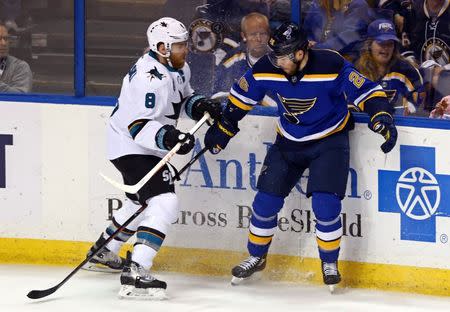 May 23, 2016; St. Louis, MO, USA; San Jose Sharks center Joe Pavelski (8) checks St. Louis Blues center Paul Stastny (26) in the first period in game five of the Western Conference Final of the 2016 Stanley Cup Playoffs at Scottrade Center. Mandatory Credit: Aaron Doster-USA TODAY Sports