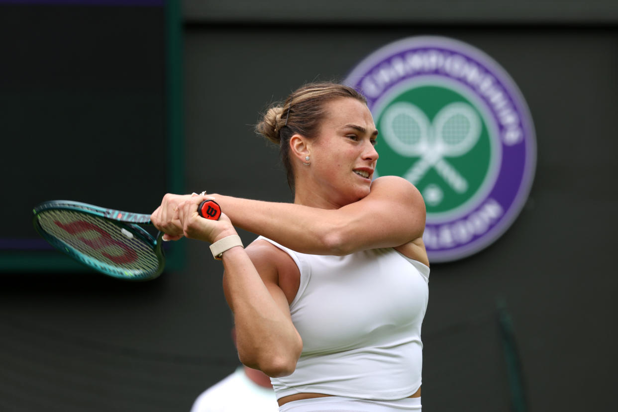 LONDON, ENGLAND - JUNE 28: Aryna Sabalenka plays a backhand during practice prior to The Championships Wimbledon 2024 at All England Lawn Tennis and Croquet Club on June 28, 2024 in London, England. (Photo by Clive Brunskill/Getty Images)